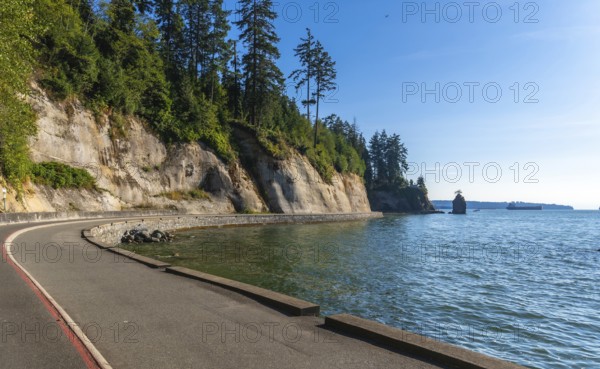Breathtaking view of the scenic road winding along the coastline in stanley park. Vancouver.