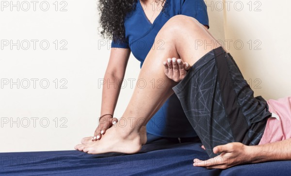 Leg rehabilitation physiotherapy. Knee and knee rehabilitation physiotherapy. Orthopedic specialist
