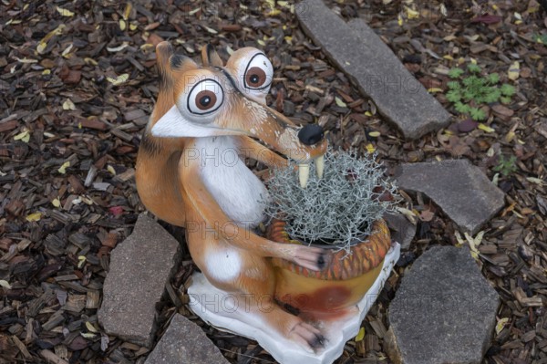 Scrat from Ice Age as a garden figure, Bavaria, Germany