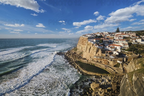 Charming seaside village of Azenhas do Mar perched on cliffs above the Atlantic Ocean. Enjoy