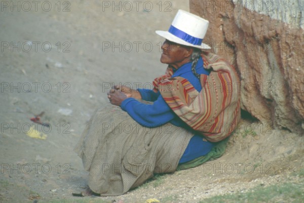 Old woman sitting on the side of the road, Cusco, Andean highlands, South America, September 1997,