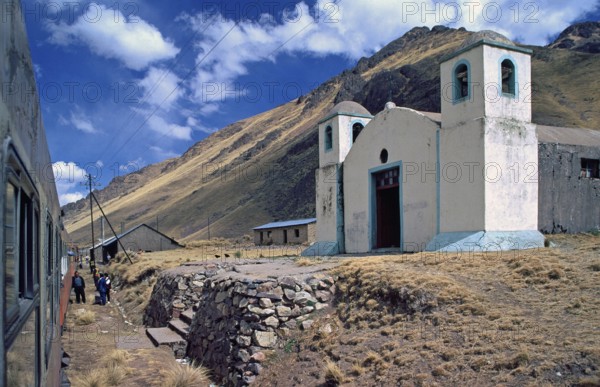 Church next to the railroad, Andean highlands between Cusco and Puno, Peru, South America,