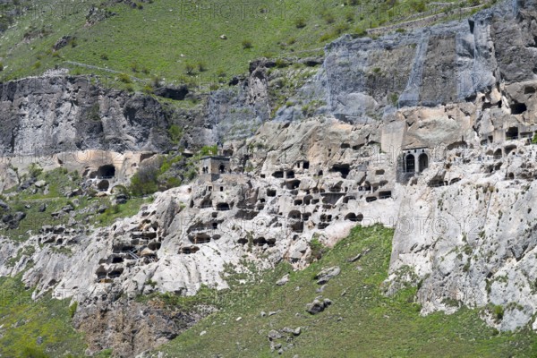 Detailed view of caves in a rocky mountain wall, cave town, cave monastery, Vardzia,