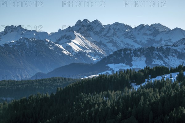 View from the high-altitude hiking trail from Bolsterlanger Horn to Riedberger Horn, snow-capped