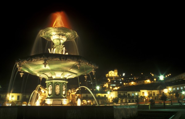 Illuminated fountain on Placa de Armas, Cusco, Andean Highlands, South America, September 1997,