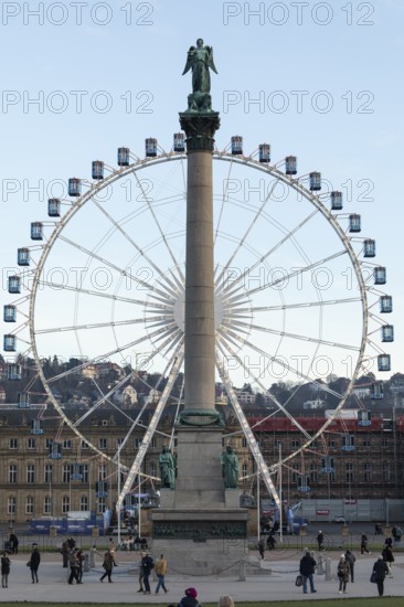 Stuttgart offers a cozy atmosphere in the evening with a view of the illuminated Ferris wheel with