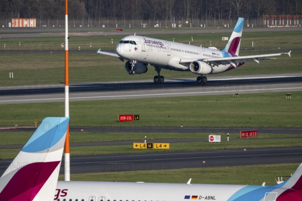 Eurowings aircraft, on field positions and on landing, Düsseldorf airport, DUS