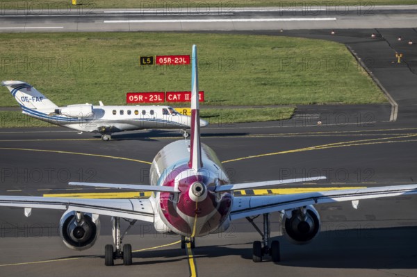 Private aircraft, Austria, OE-FAF Cessna 525A CitationJet CJ2, Eurowings Airbus on taxiway to take