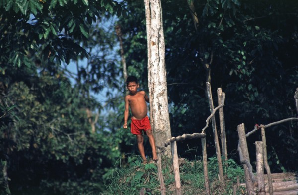 Little boy on the banks of the Amazon near Iquitos, Peru, South America, September 1997, vintage,