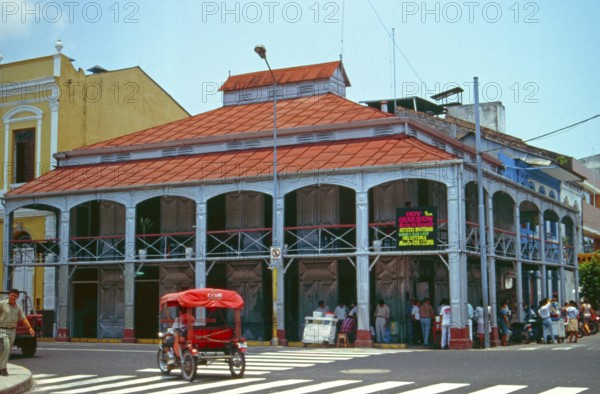 Tuk-tuk, iron house built by Gustav Eiffel in the center of Iquitos on the Amazon, Peru, South