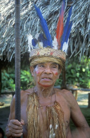 Chief of a Yagua tribe near Iquitos on the Amazon poses for photos, Peru, South America, September