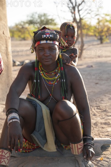 Portrait, brightly decorated woman and customer of the Hakaona tribe, also Havakona or Hakawona,
