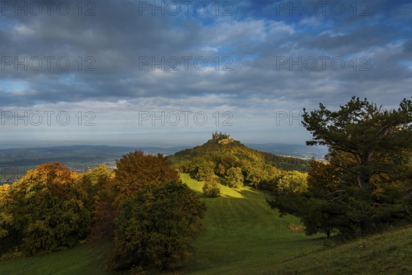 Castle and autumnal forest, Hohenzollern Castle, sunrise, Hechingen, Swabian Jura,