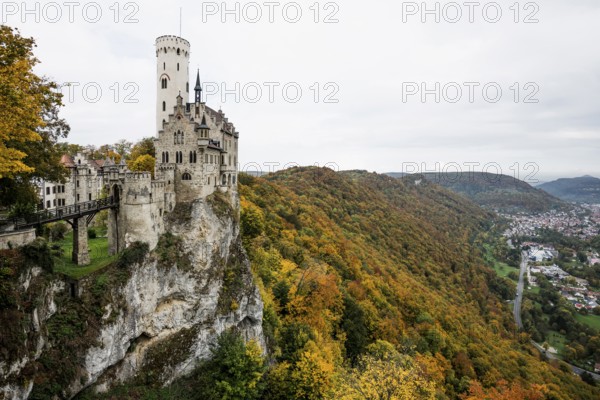 Castle and autumnal forest, Lichtenstein Castle, Honau, Echaz Valley, Swabian Jura,