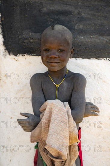 Portrait, child of the Hakaona tribe, also Havakona or Hakawona, near Opuwo, Kunene, Namibia