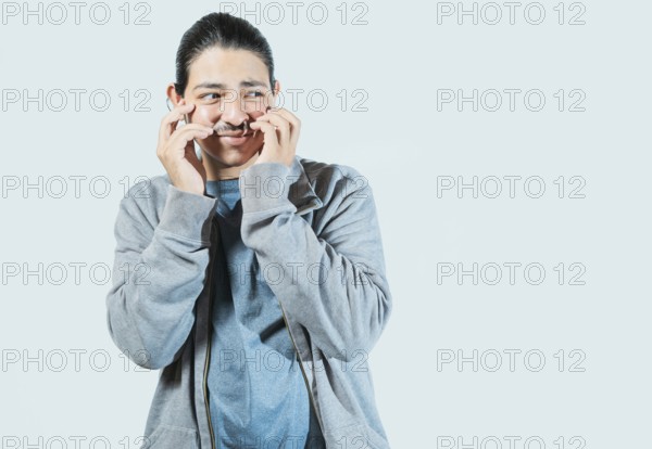 Guy with disgusted face looking to the side isolated. Person with embarrassed face looking to the