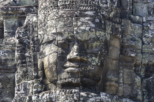 Huge stone-carved faces of Bodhisattva Lokeshvara, also Avalokiteshvara, Bayon Temple, Angkor Thom,