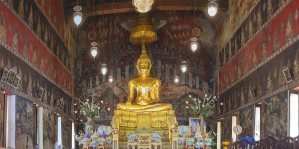 Golden Buddha statue with Bhumispara-mudra, Buddha Gautama at the moment of enlightenment,