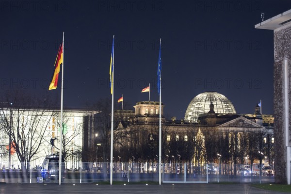 Flags of the Federal Republic of Germany, Ukraine and the European Union in front of the Federal