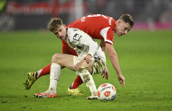 Duel, dogged action, Nikolas Veratschnig 1. FSV Mainz 05 (22) against Joshua Kimmich FC Bayern