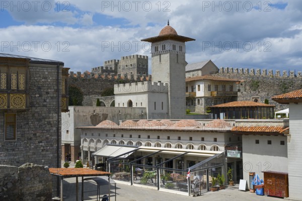 An extensive medieval complex with a distinctive watchtower and battlements, Rabati Fortress,