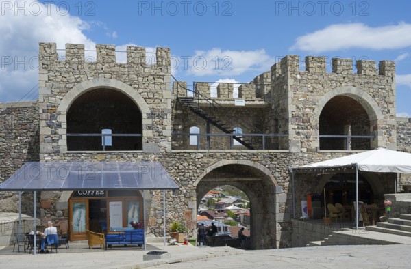 A café in a medieval castle with stone floors and arches, covered by a terrace, Rabati Fortress,