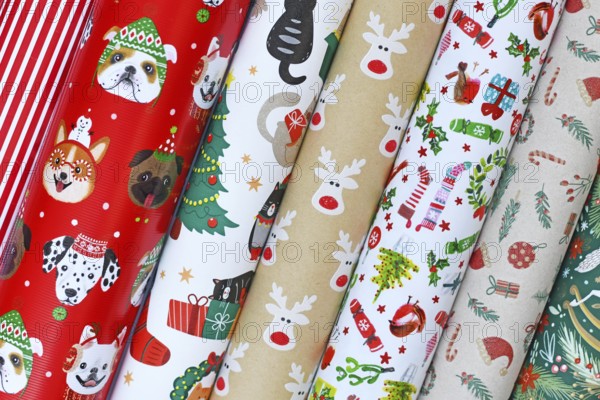 Close up of rolls of different seasonal Christmas wrapping papers