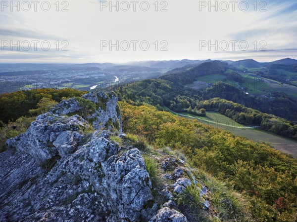 View from the Gisliflue of an autumnal forest with the Jura foothills behind, Talheim, Canton,