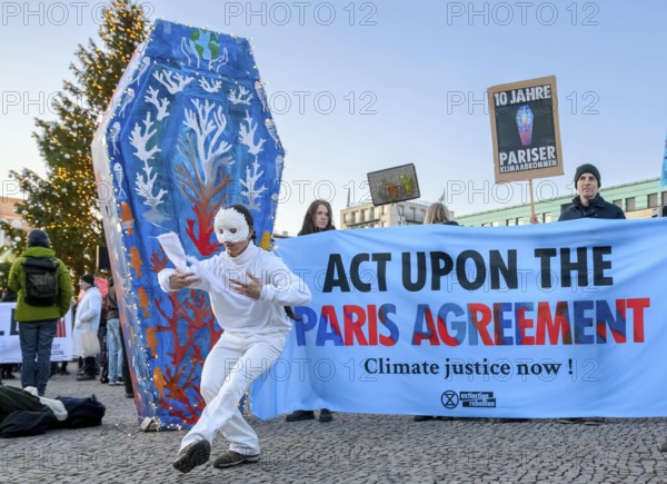 Dancers from Extinction Rebellion dance at Fridays for Future rally to mark the tenth anniversary