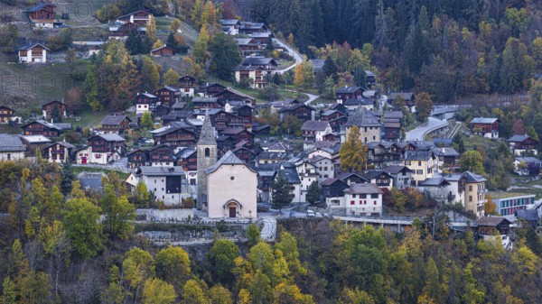 The mountain village of Vissoie with the Sainte Euphemie church at dawn, Val d'Anniviers, Valais