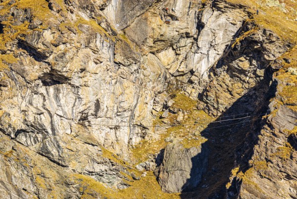 Suspension bridge on a via ferrata near the Lac de Moiry reservoir, Val d'Anniviers, Valais Alps,