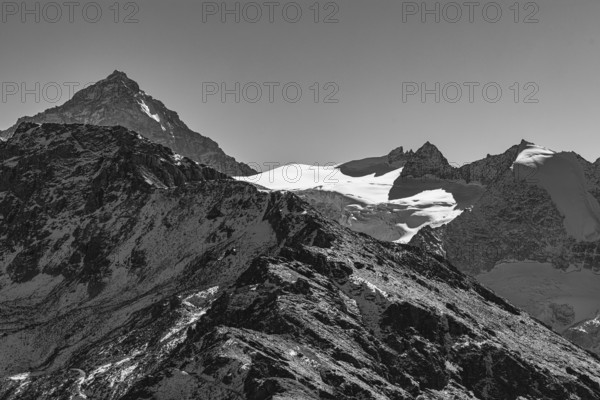 Snowy peaks of the Garde de Bordon and Dent d'Herens mountains, black and white photo, Val