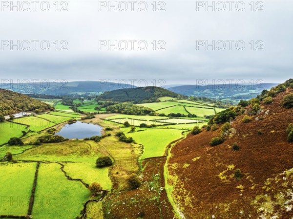 Autumn Colours over Gwynllyn Lake and Stream Nantgwynllyn from a drone, Rhayader, Powys,