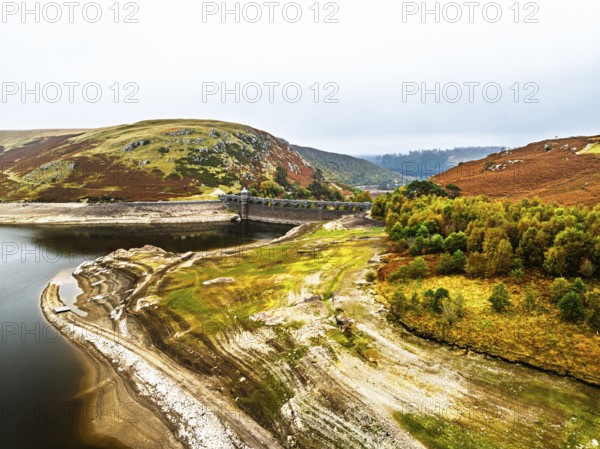 Autumn over Craig Goch Dam from a drone, Elan Valley Reservoirs, Elan Valley, Rhayader, Powys,