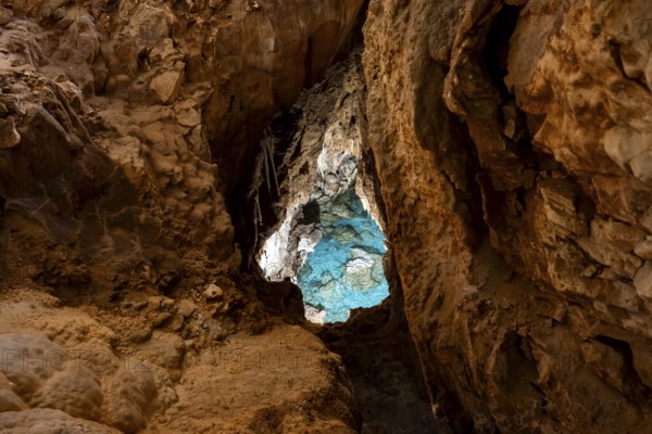 Seawater penetrates the cave through underground access, stalactite cave, Grotta del Fico, Gulf of