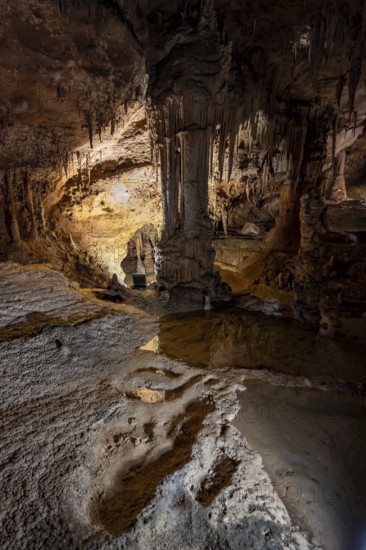 Stalactites and stalagmites, water basins and rock formations in a stalactite cave, Grotta del