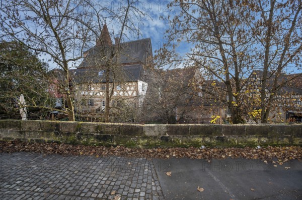 Historic city wall with old town houses, half-timbered house from 1799 in the back, Lauf an der