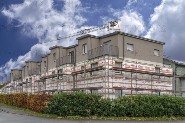 Installation of thermal insulation on a residential block, Eckental, Middle Franconia, Bavaria,