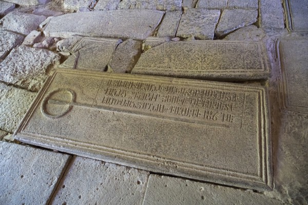 Stone slab with engraved text, part of a historical archaeological find, Sanahin monastery, Sanahin