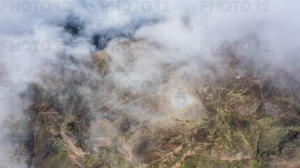 Aerial view, clouds of fog with halo, light ring, atmospheric phenomenon, mountains, Madeira,