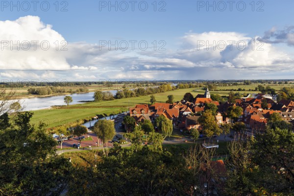 View of half-timbered houses and church in Hitzacker, banks of the Elbe, river landscape,