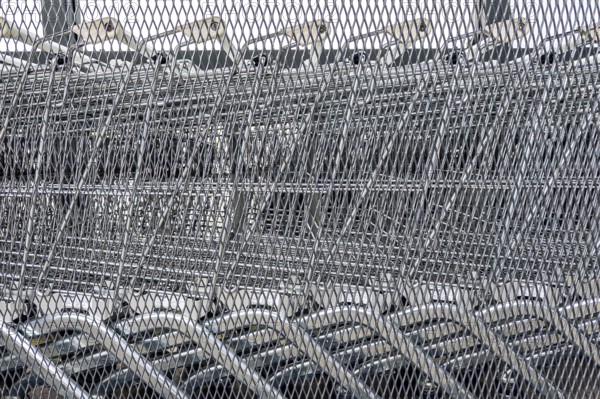 Close-up of several unused shopping carts, economic crisis, consumption