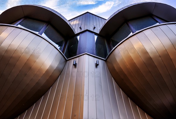 Futuristic balconies with bay windows on a prefabricated building from the sixties in
