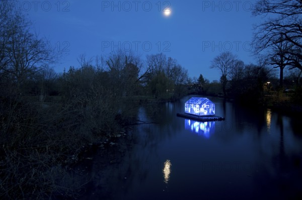 The river Lippe with the artwork Arche by Christoph Hildebrand at night with full moon, Lippstadt