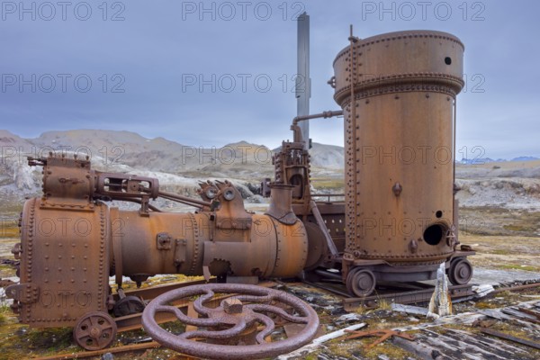 Steam engine at abandoned marble quarry Camp Mansfield, Ny London near Ny-Alesund,