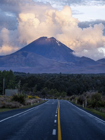 Roadshot, Mount Ngauruhoe evening at sunset, road SH 47. Tongariro National Park, North Island, New