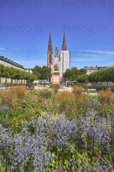 Park, flower bed, plants, Waterloo monument, St. Boniface Catholic Church, scaffolding, renovation,