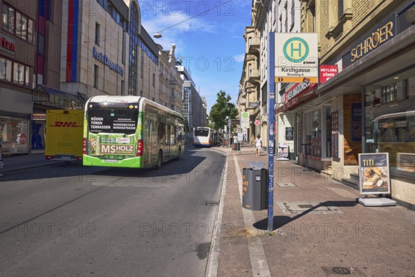 Kirchgasse bus platform A, public trash can, general architecture, residential and commercial