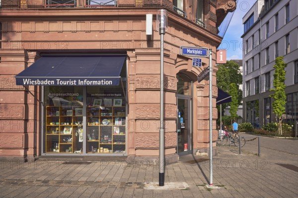 Wiesbaden tourist information, historic commercial building, awnings, shop windows, tourist