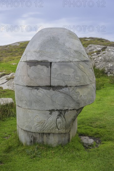 Stone monument with animal representations on the way to the Slieve League cliffs, West Donegal,